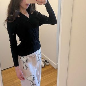 Brand new adorable knit black top w/ twisted design in the center(check 3rd pic)